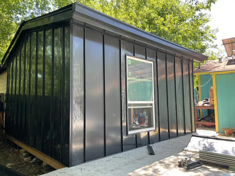 Black standing seam metal wall panels for Roof Inspection in Orlando